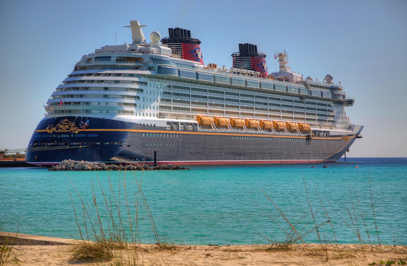 The Disney Dream ship in Castaway Cay, Bahamas in 2013. Two Disney Cruise Line employees have been arrested this year on charges of child pornography.