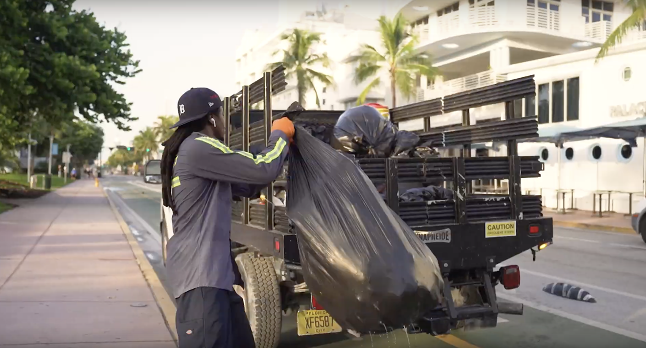 A Miami Beach worker is featured on the job in a promotional video praising the city's sanitation department.